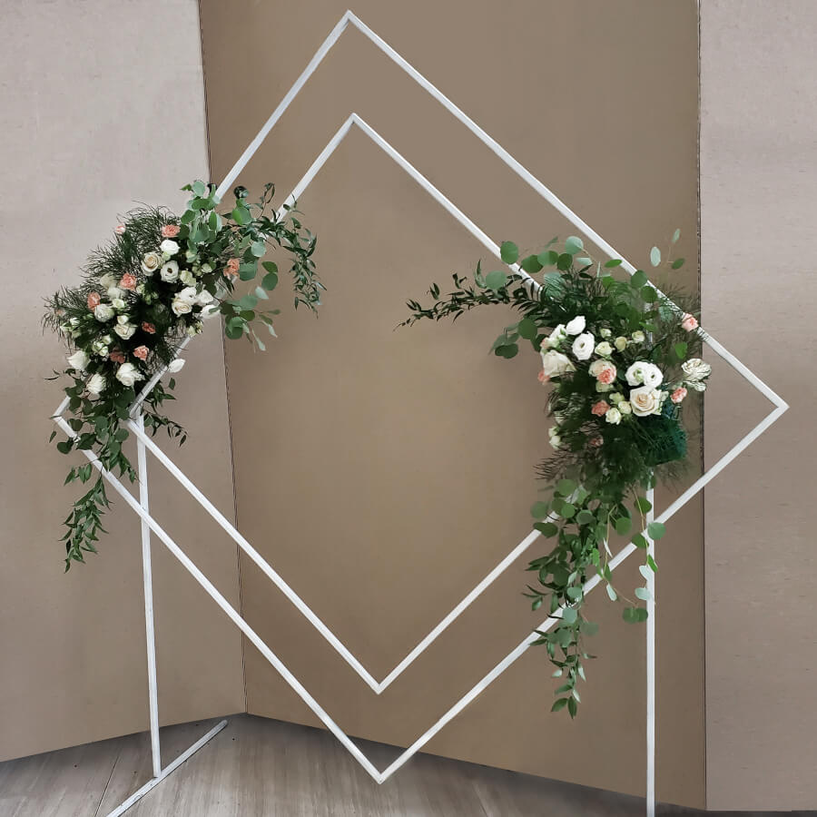 White Geometric Diamond Arbor with Florals | Uniquely Chic Vintage Rentals
