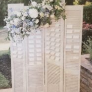 White Shutter Backdrop & Seating Chart